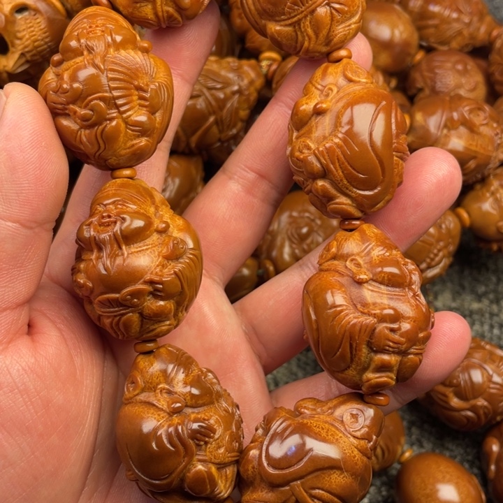 橄榄核吊坠创****始橄榄核手持