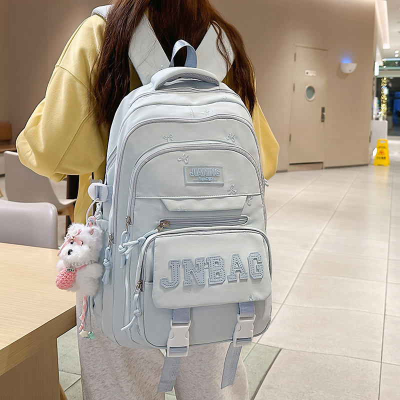 书包女韩版百搭初中生高中小学生减负轻便蝴蝶结背包高颜值双肩包