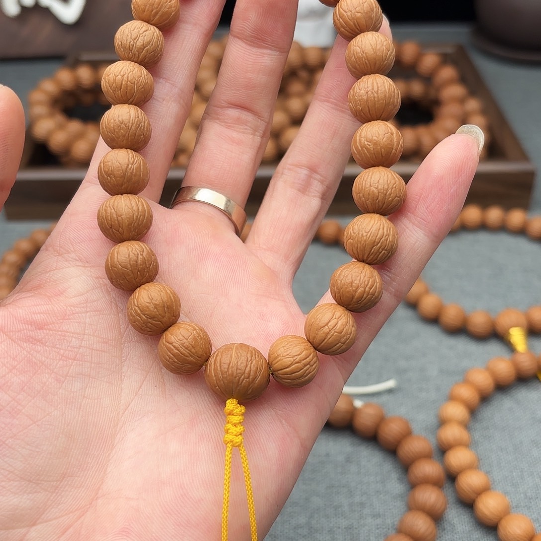 杰***头猴头核桃吊坠凤羽