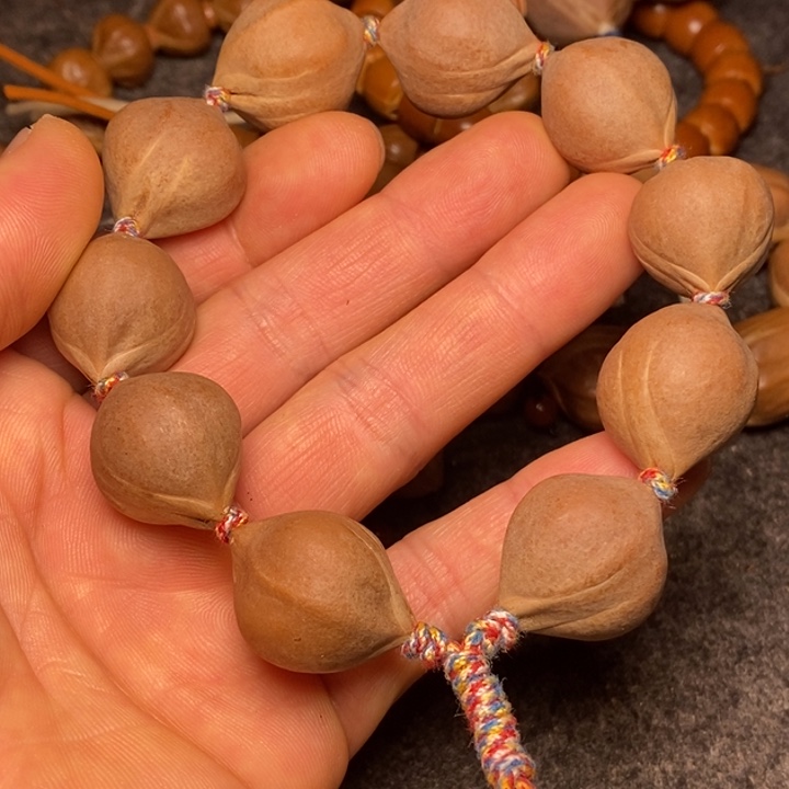 橄榄核手串1.9两花48号