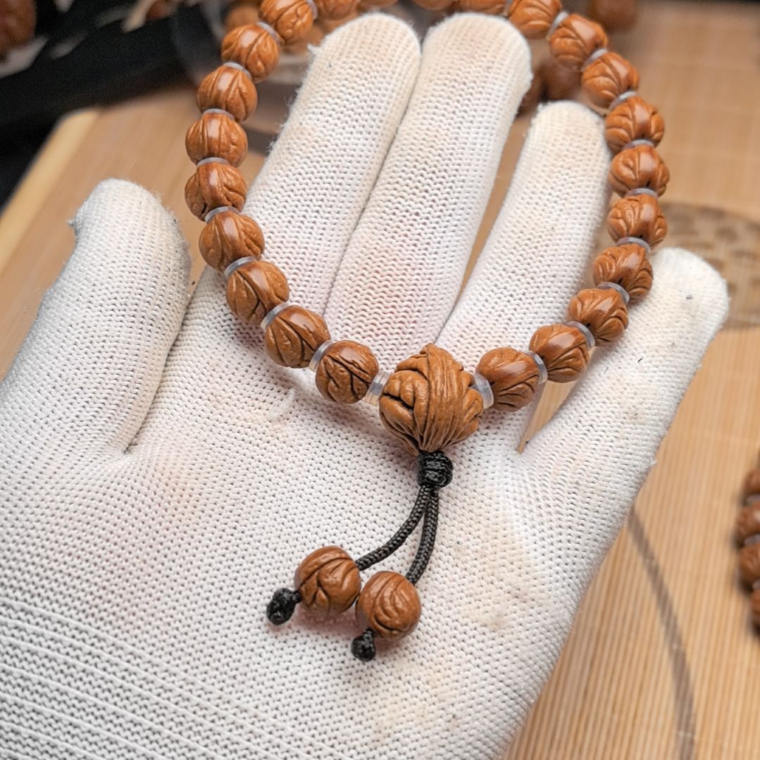 桃核吊坠小龙纹手持