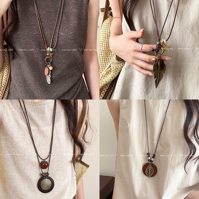 2025年新款新中式羽毛项链女复古风民族风双层叠戴长款毛衣链配饰
