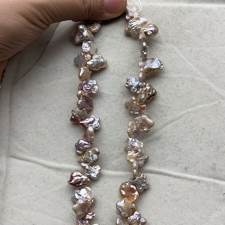 玛瑙/玉髓未镶嵌珠宝半成品一条花瓣巴洛克珍珠有矿点