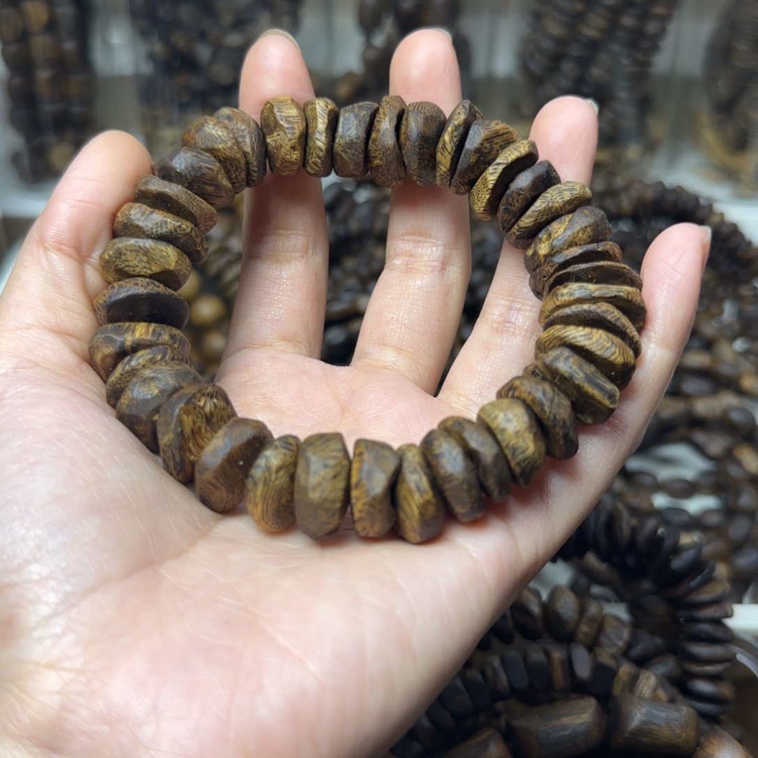 一***花手串沉香单圈树丁包壳高油28克乌身圆叶