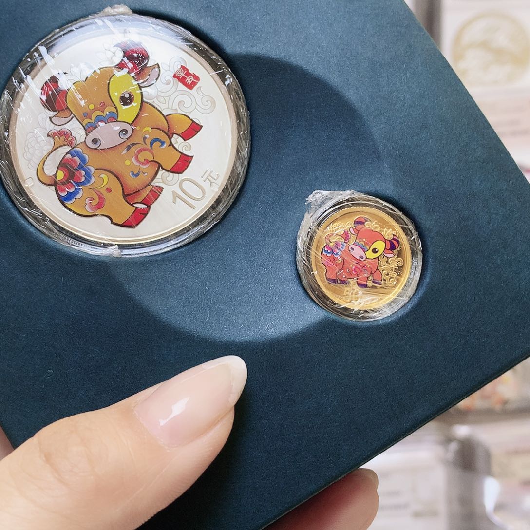 孔***兄纯银2021年牛彩金银原盒证