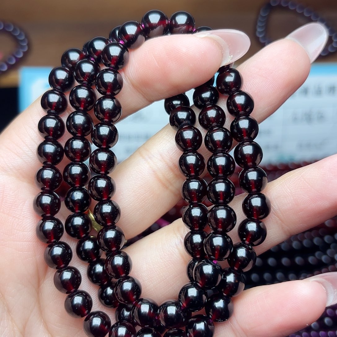 罗***万手链未镶嵌石榴石卡7酒红三圈毕业级