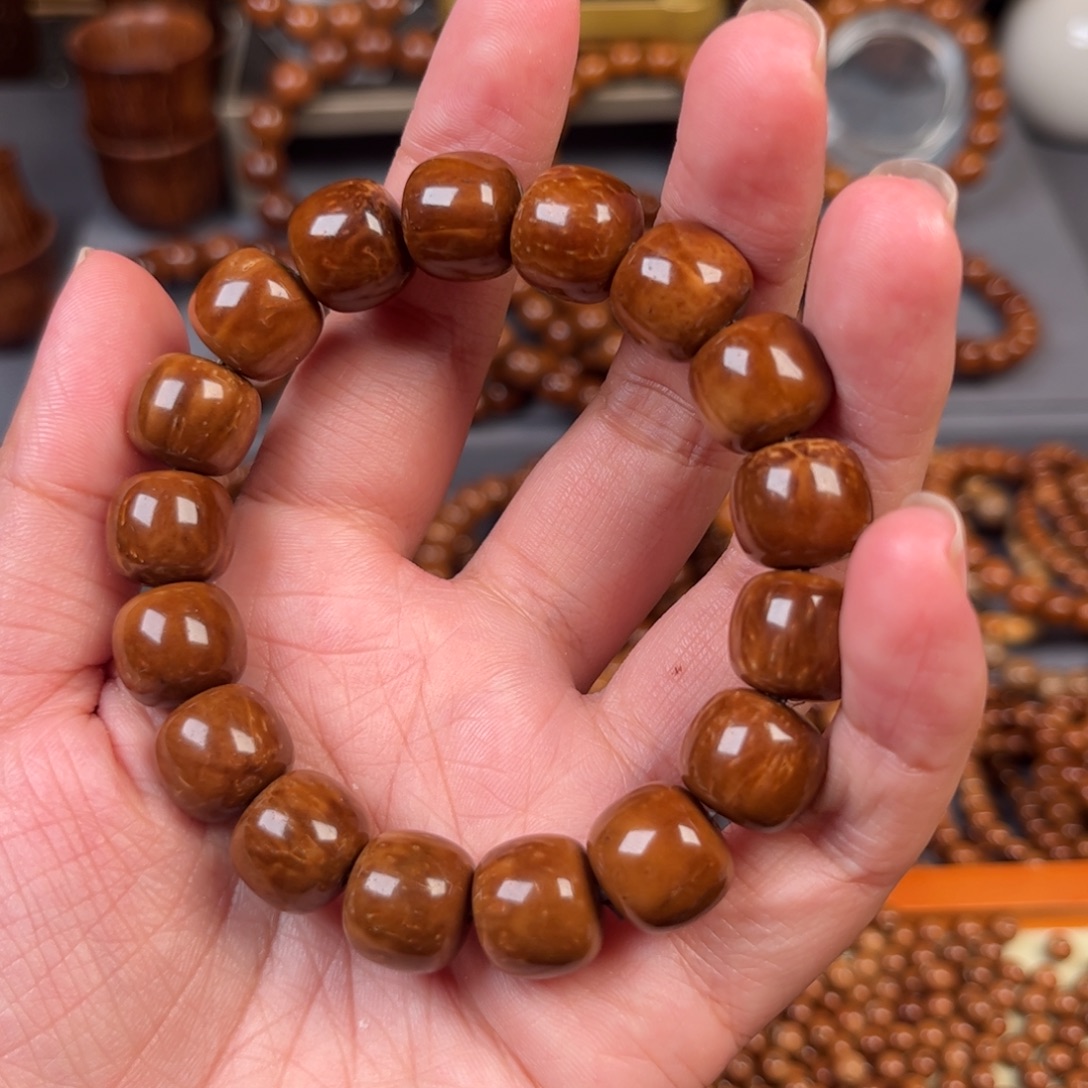 自***渡果皮12*13老型单圈手串