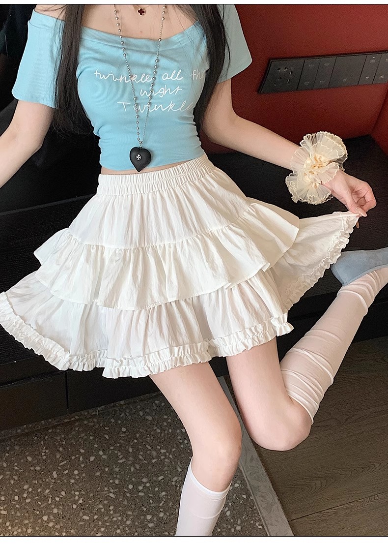 法式木耳边白色拼接半身裙子2025夏季新款A字显瘦蛋糕短裙