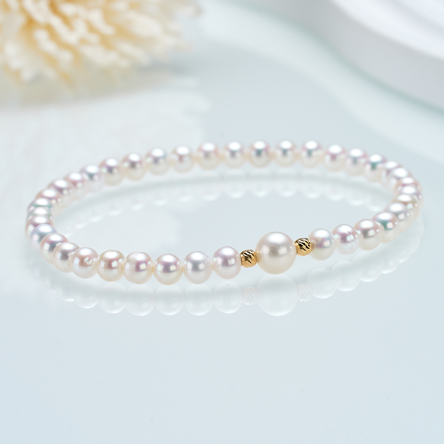 G18K 淡水珍珠K金豆掌上明珠弹力绳手链白色时尚强光仙女DSL010