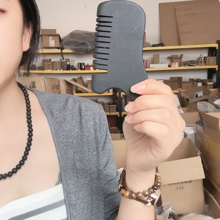 泗水砭石疗养院手把件随机