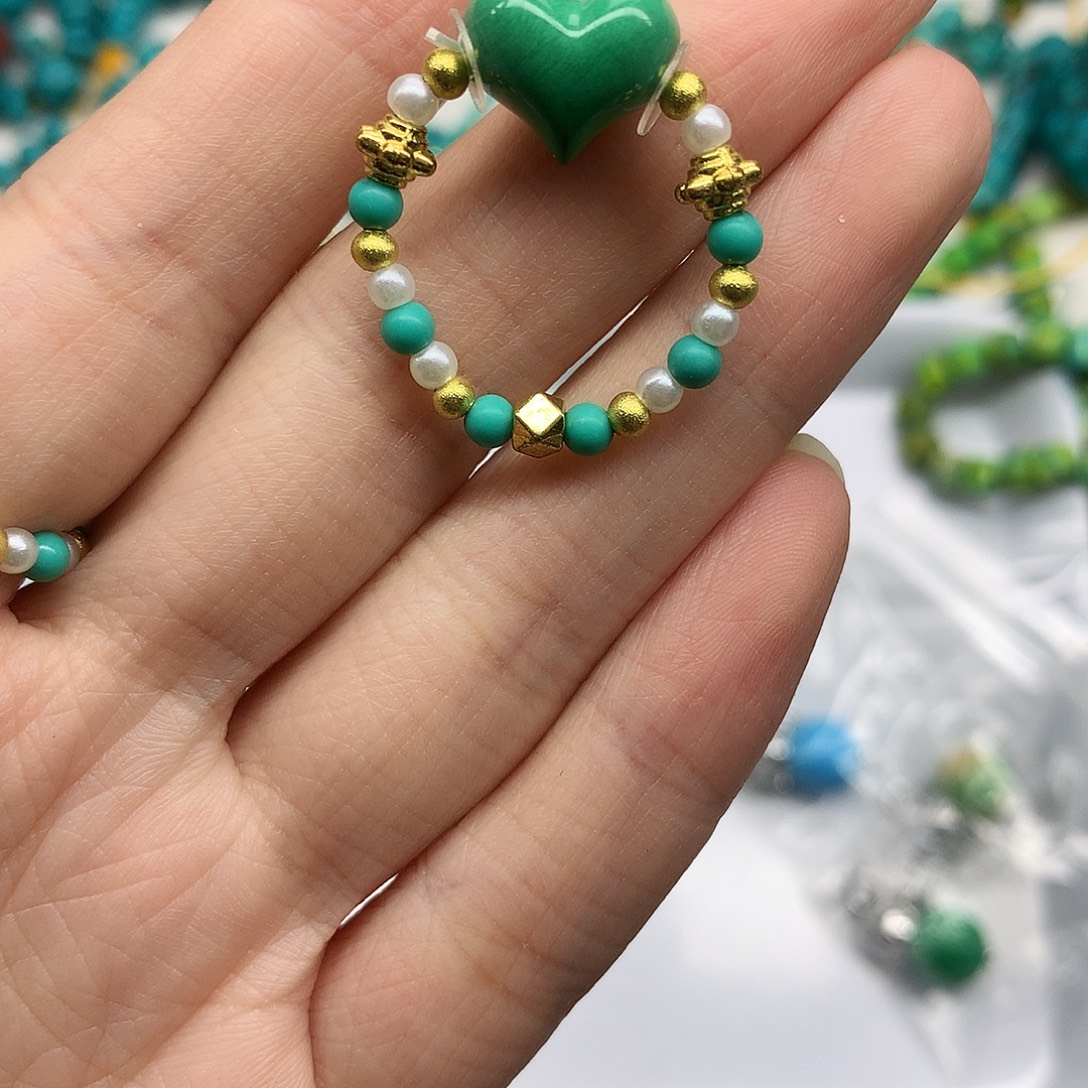 ℒ***子非金属屁桃戒指果冻绿