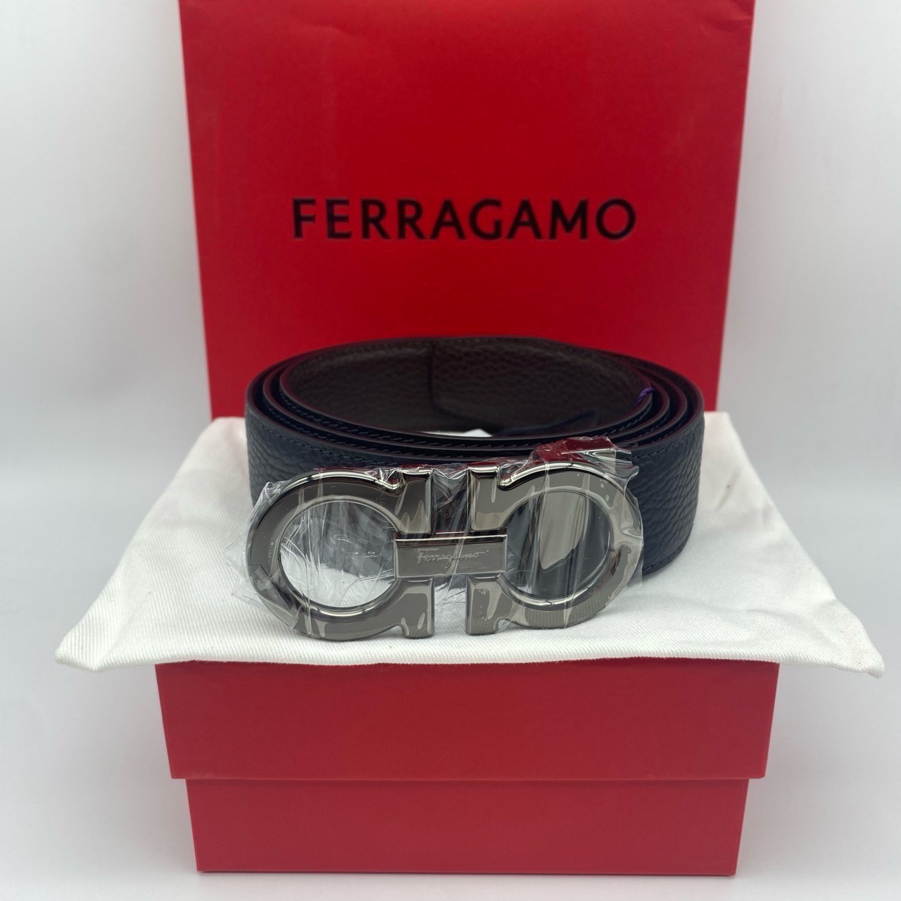 99新 FERRAGAMO/菲拉格慕 菲拉格慕黑棕荔软皮110码皮带12896679