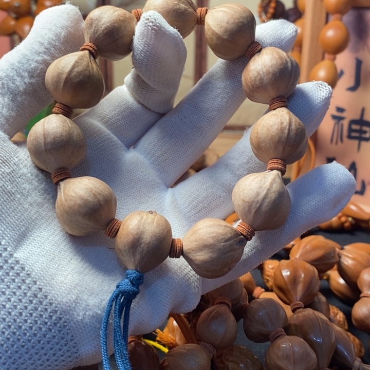 樊***樊橄榄核手串/手链1.9原皮三花