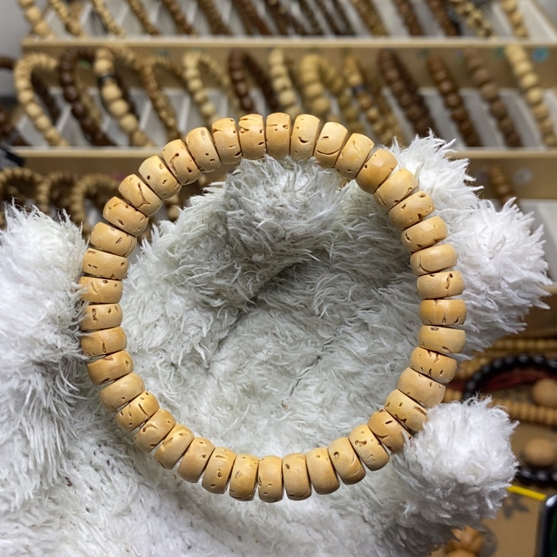 自***成手串紫金鼠桃核实心8.6