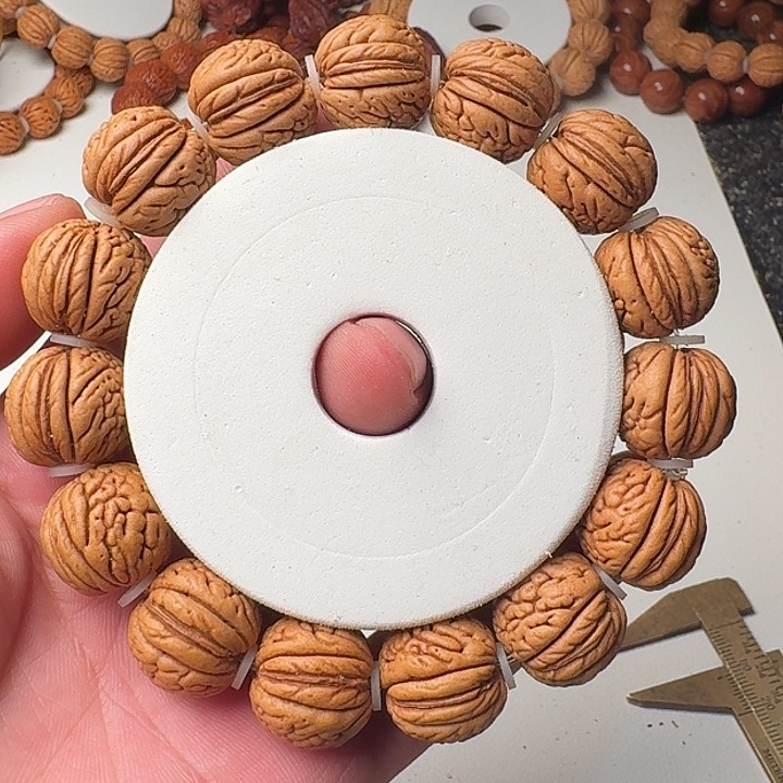 桃核吊坠盘锦肌肉桃核手串