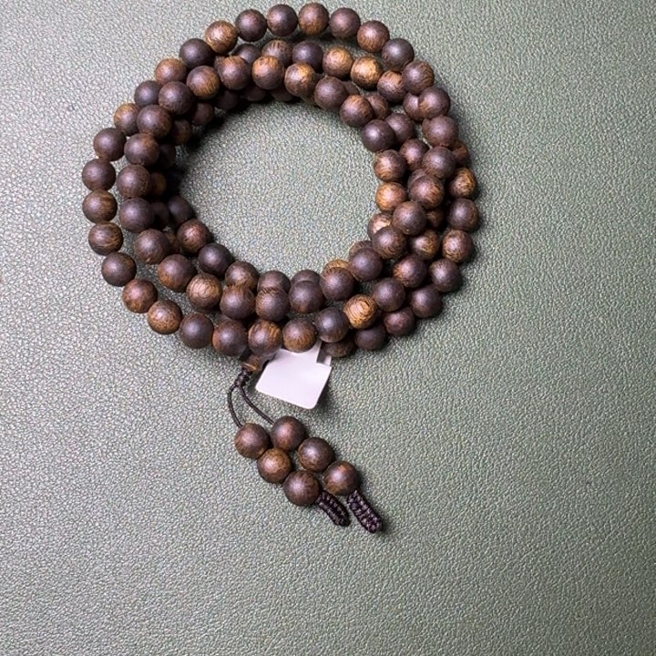 沉香手串福****哈海南陆河树心油沉水浮老料23克