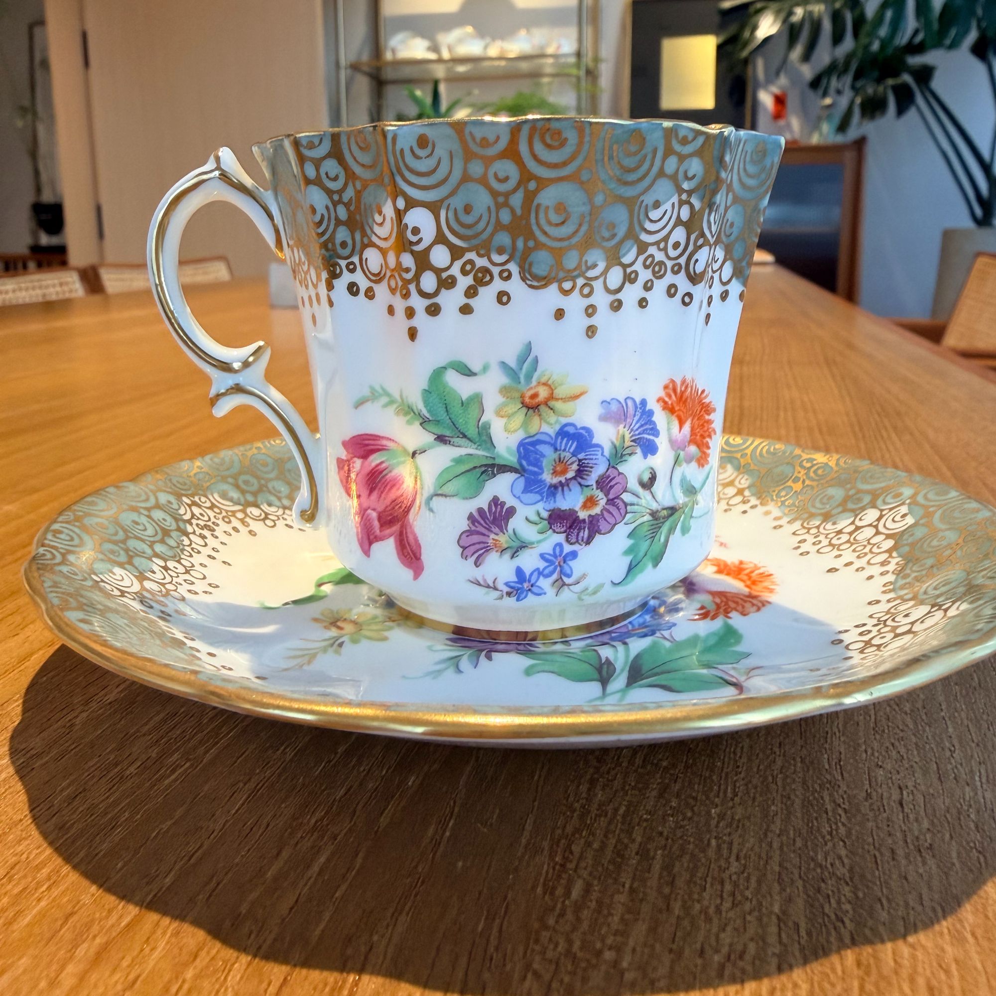 骨瓷描金茶杯(绿花簇)