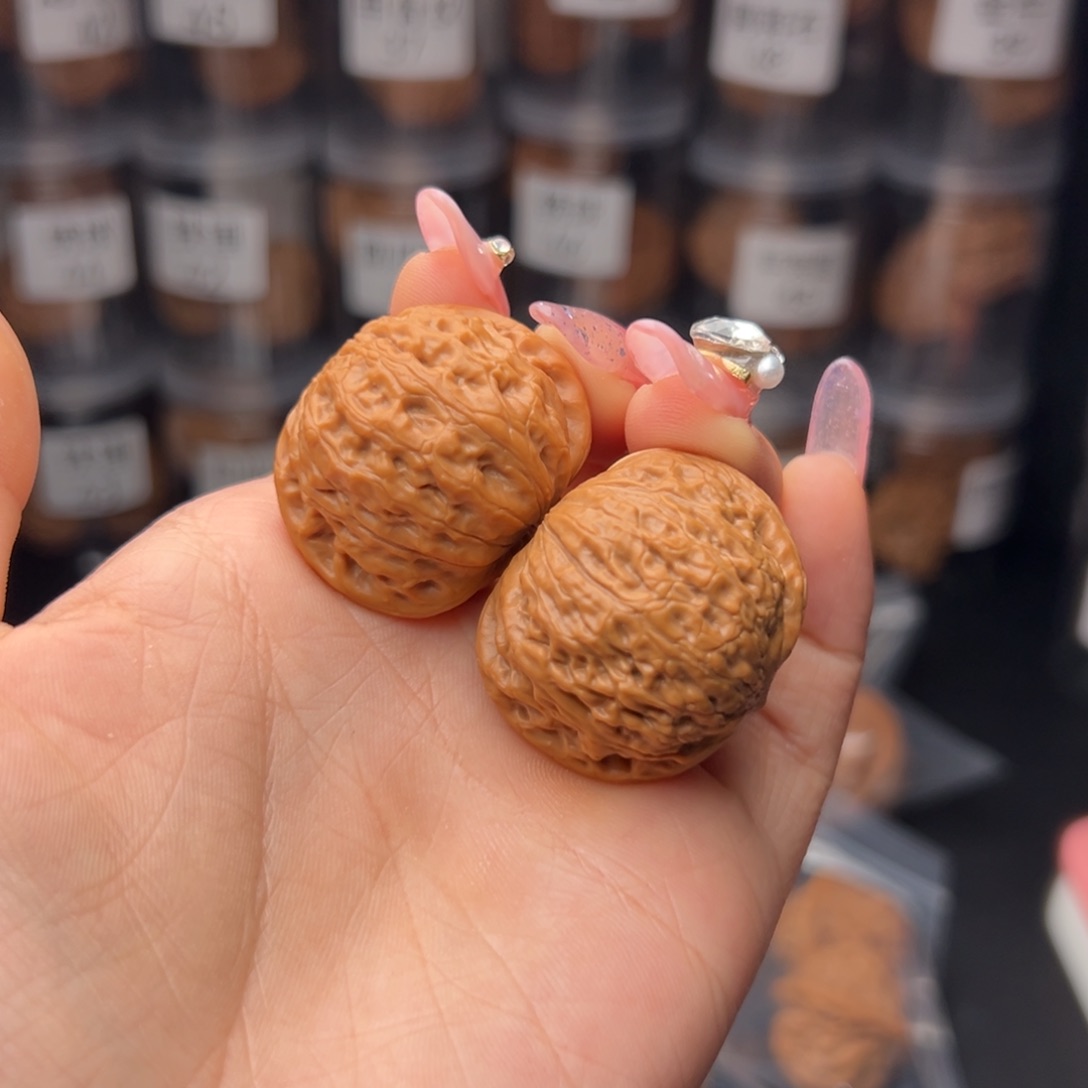 文玩核桃吊坠有***?铁锤