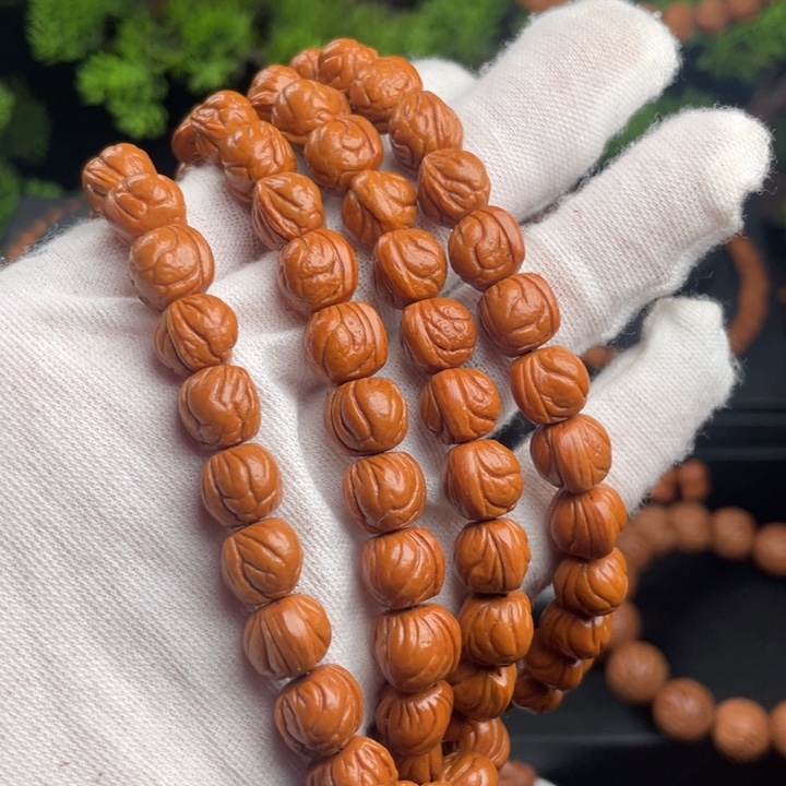 沐***辰吊坠桃核精品脖挂