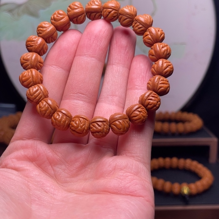 桃核手串12凤羽手串