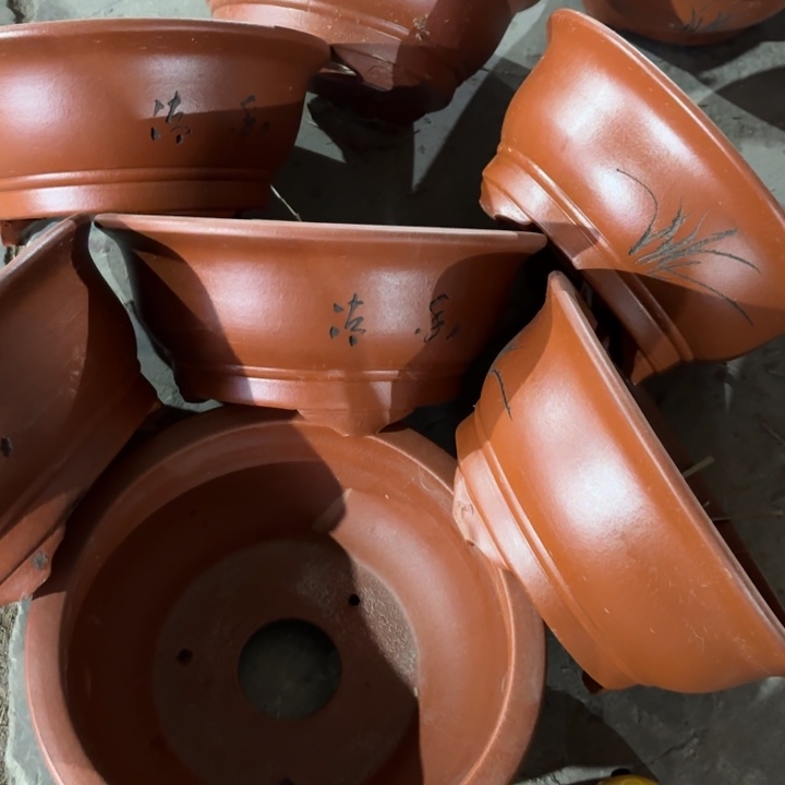 紫砂花盆100-7。   23-10