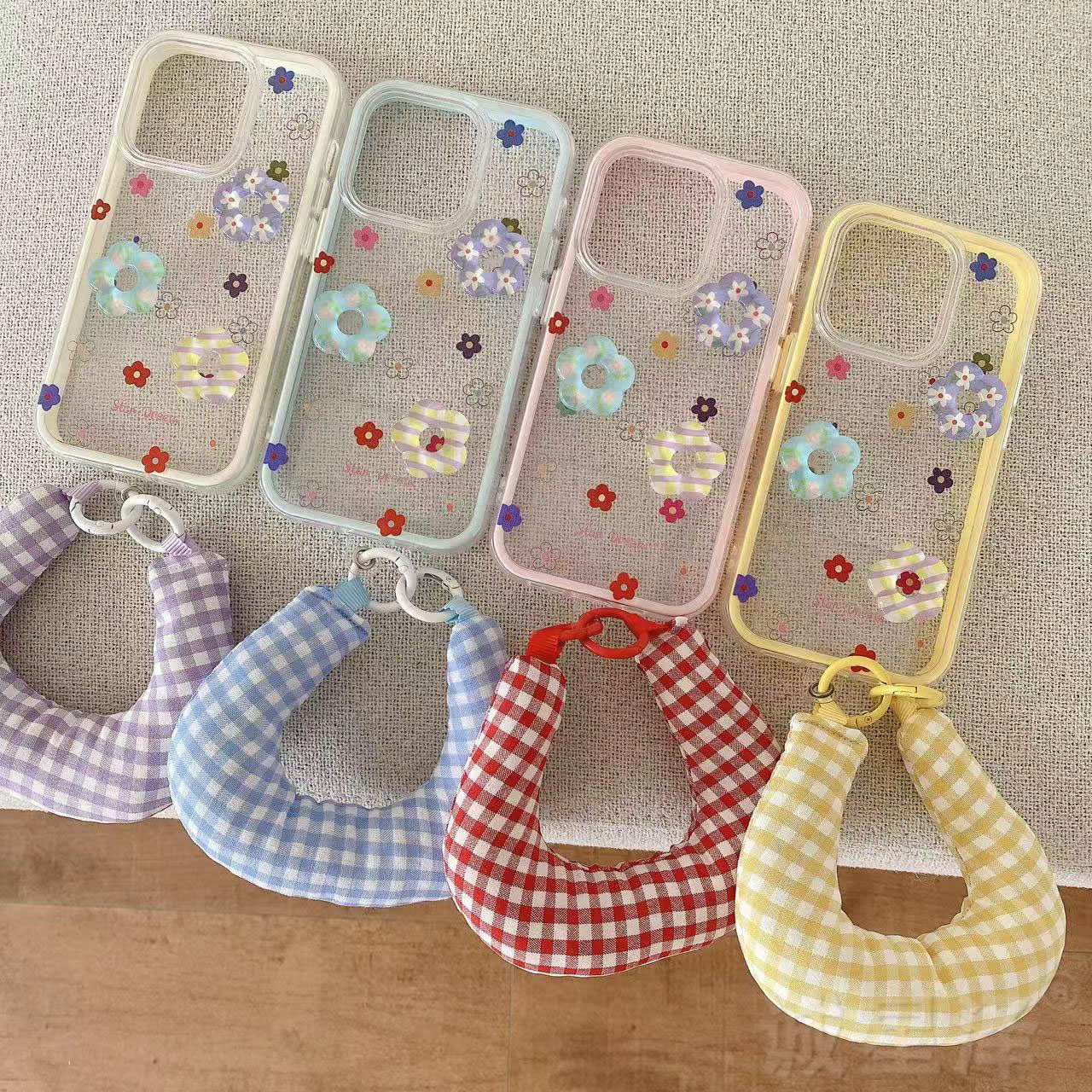 夏日花朵格子腕带适用苹果16Pro手机壳iPhone15/14/13/12手提11女