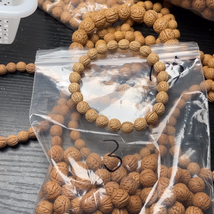 遇***心核桃散籽批发小桃核160