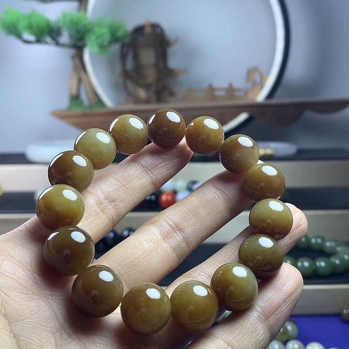 莫***金和田玉未镶嵌手串