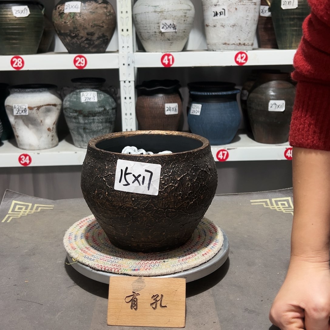 红陶68小平口一个有孔