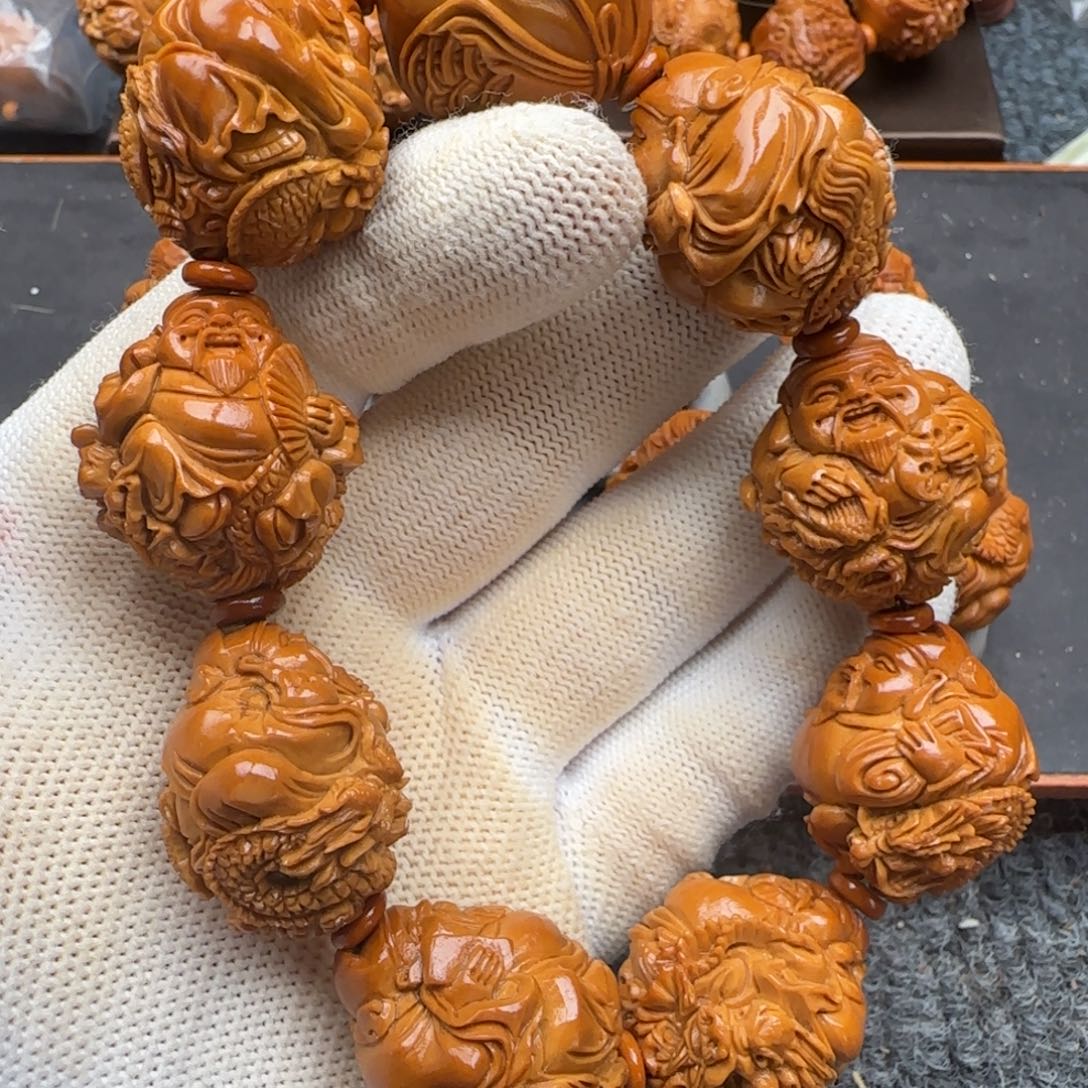 起***落橄榄核吊坠……………………