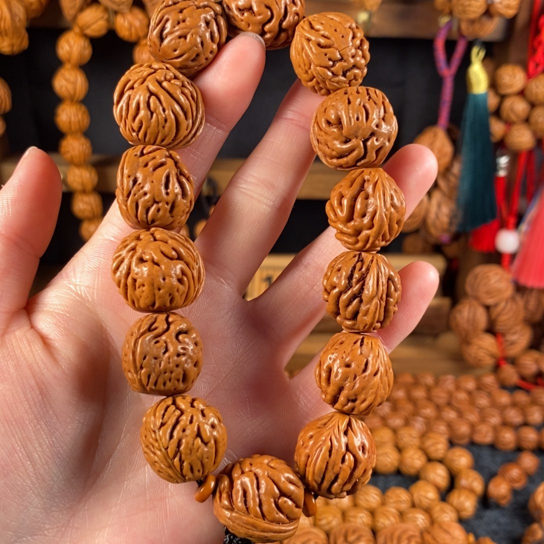 吊坠桃核8链接桃枭手串