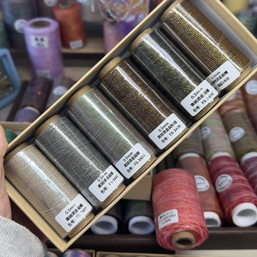 0.5洒金扁蜡 黑粽金套盒四