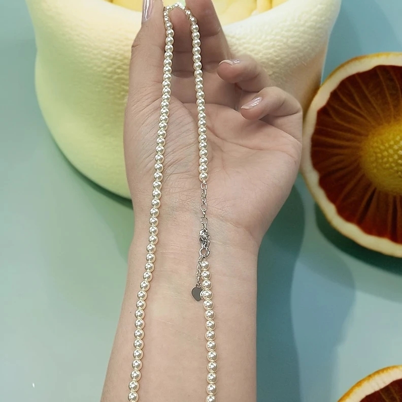 老板娘晶晶-XL03225--时尚气质女神款香槟金小米珠