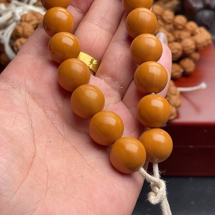 橄榄核吊坠猴头手串