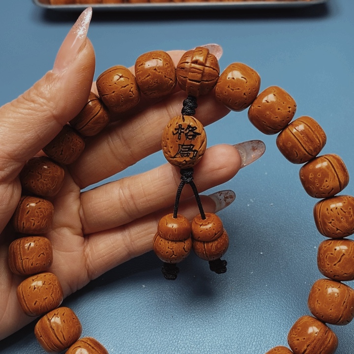 桃核手持老邢16花皮色差21颗