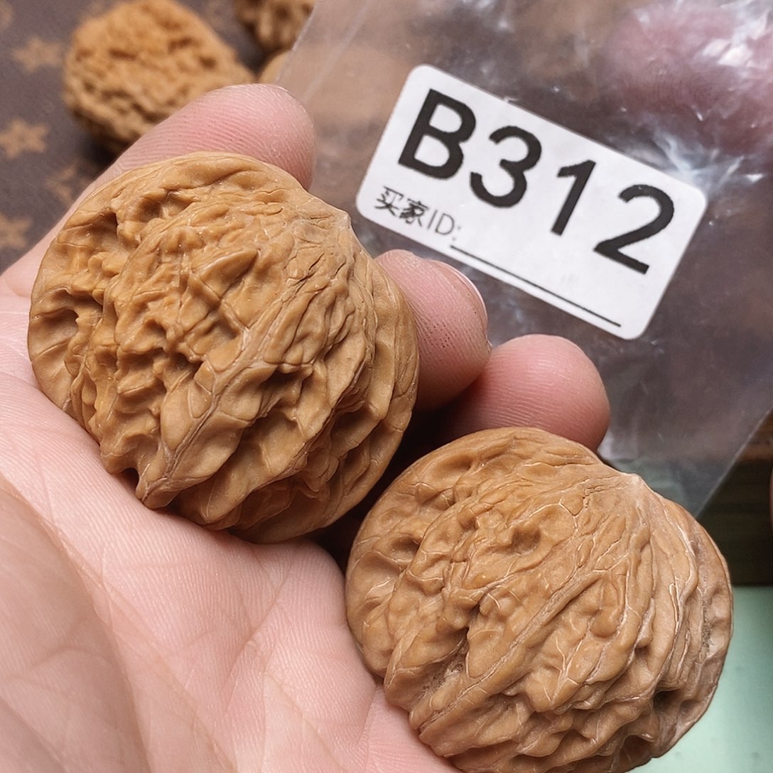 文玩核桃把件磨盘。   