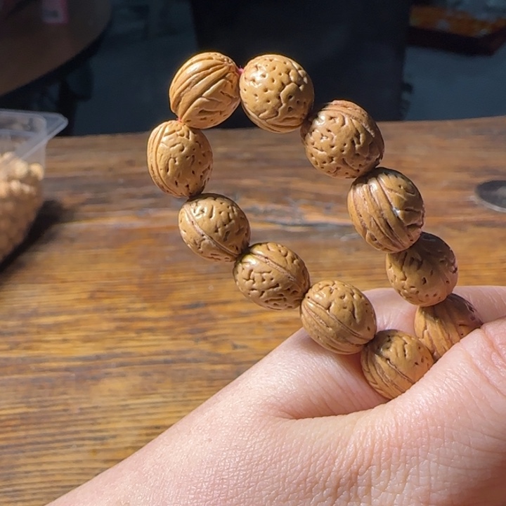 i***4桃核吊坠盘锦小钱袋子手持