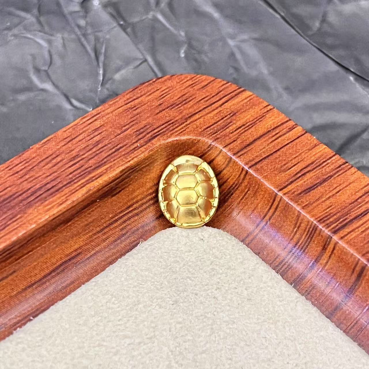 君潮黄金*足金999黄金通孔富甲编绳款DP0572