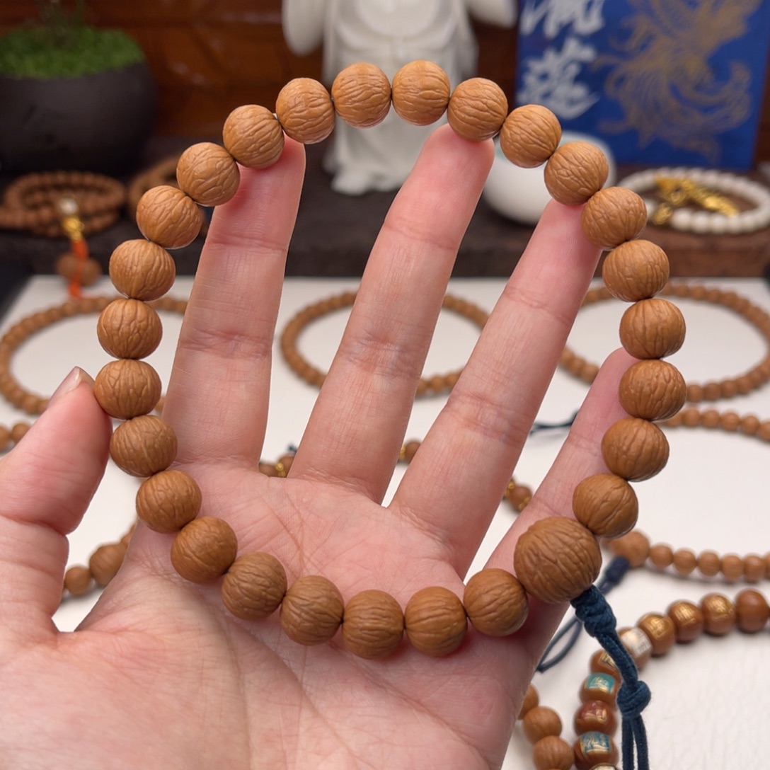 锦***。猴头核桃吊坠凤羽12