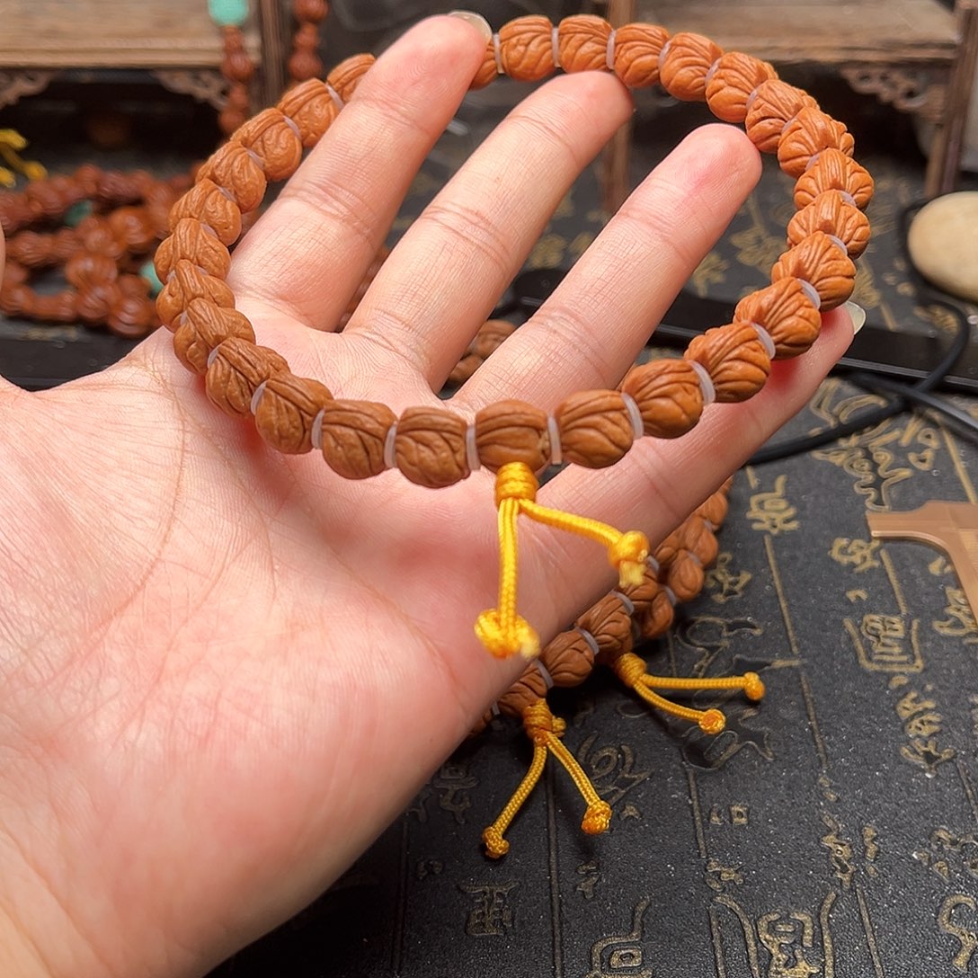 桃核吊坠玉龙手持