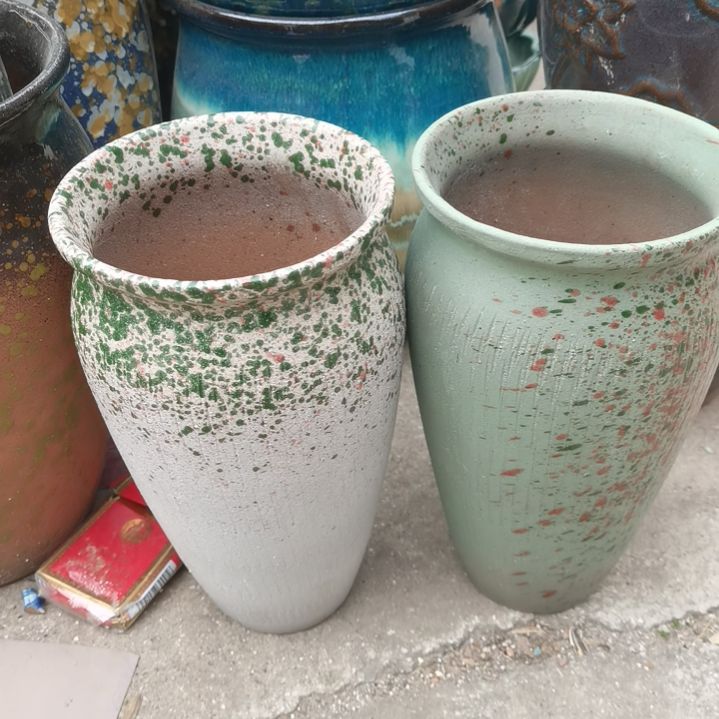 红陶口14高25瑕疵口变形扁了