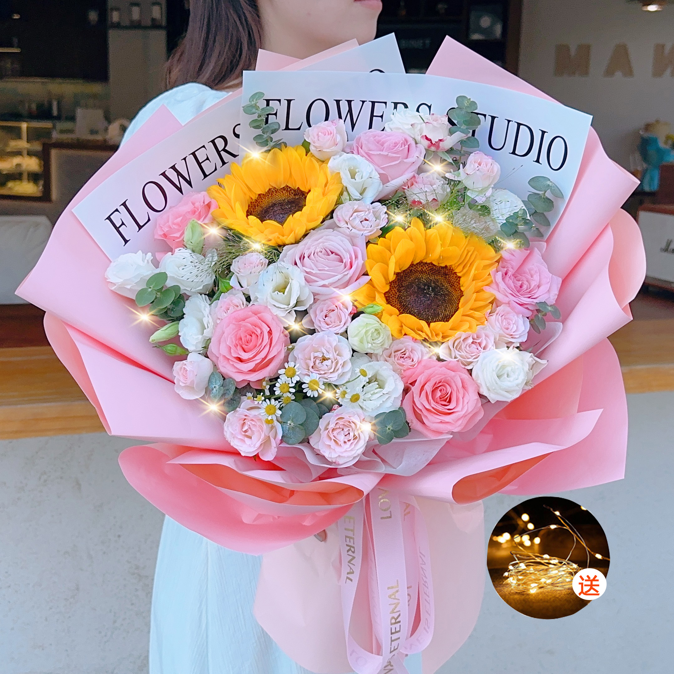 2朵向日葵6朵粉玫瑰