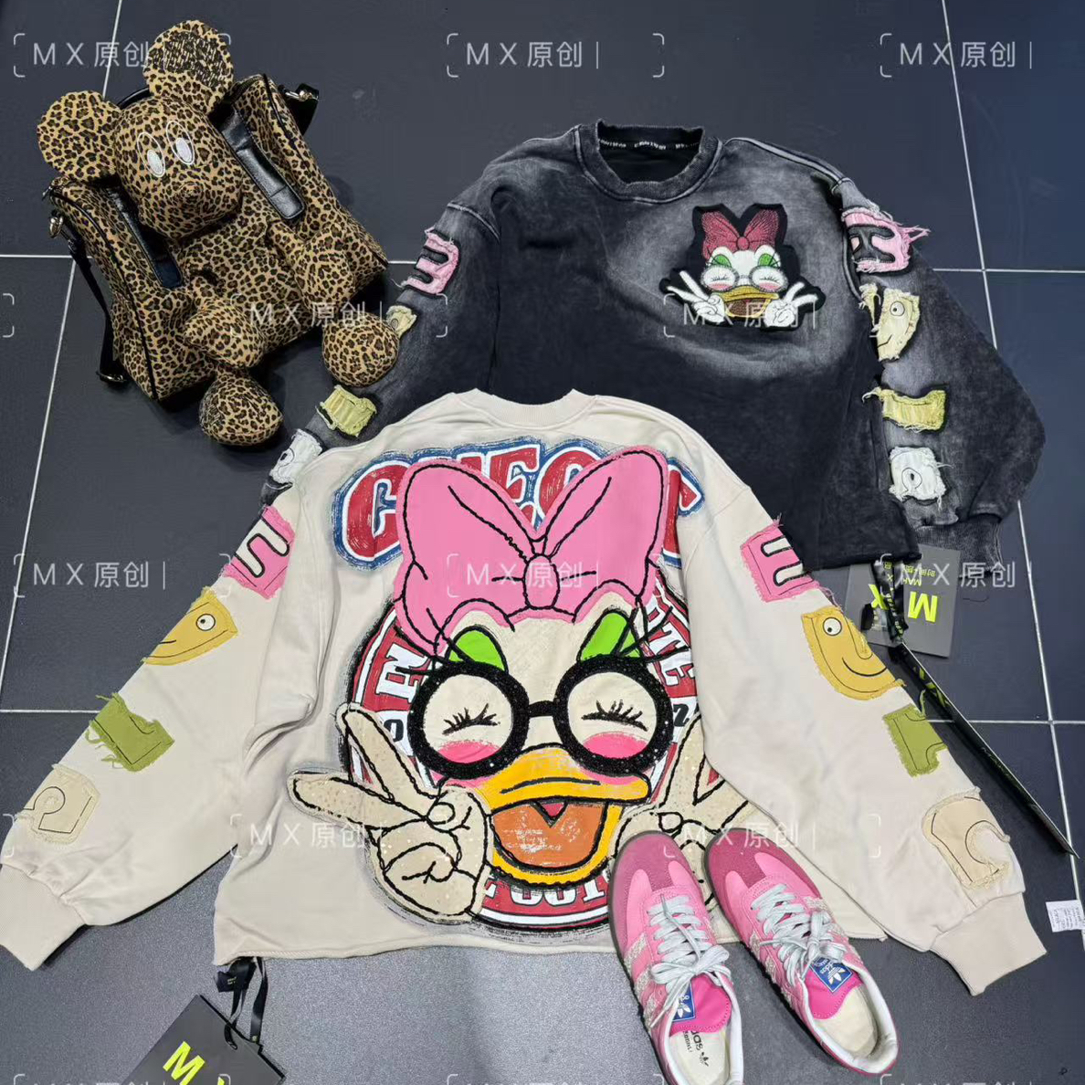 【682】秋季百搭街头风宽松型圆领拼接潮牌重工贴布长袖唐老鸭卫衣