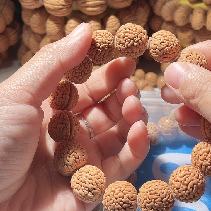 爱***哥桃核吊坠桃核手串野生64