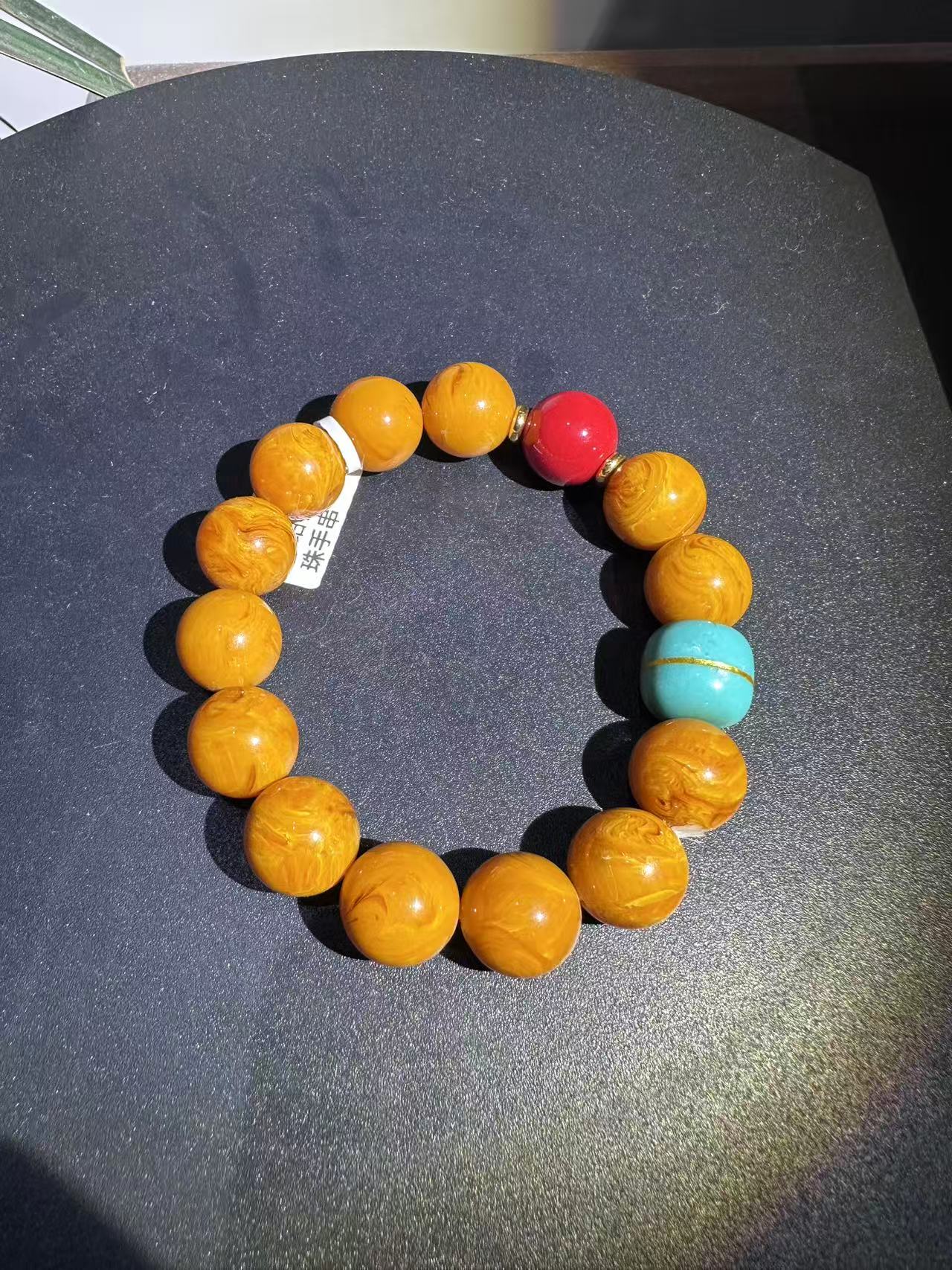 ML0662精品黄带红绿手串单圈（无礼盒）