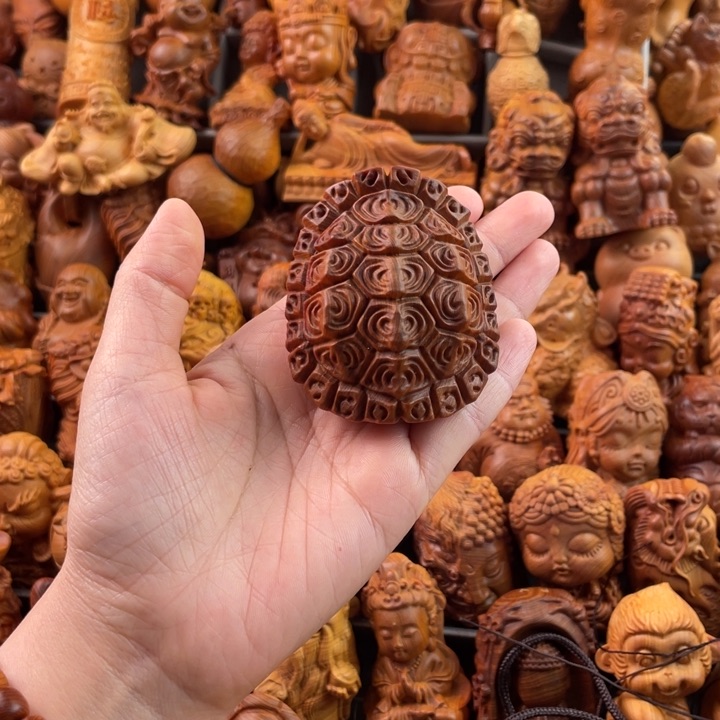 崖柏一物一拍手把件