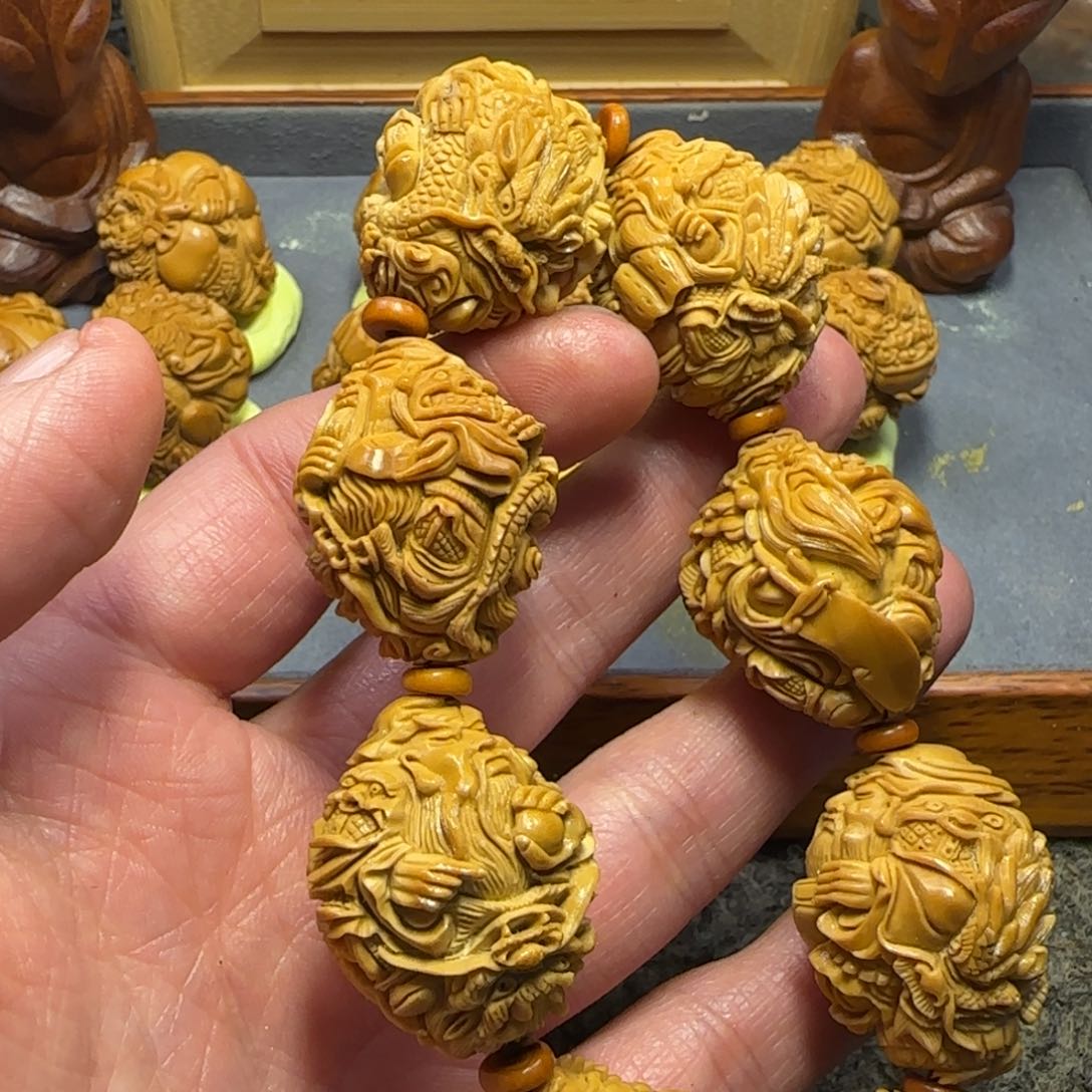 橄榄核吊坠你**迪……………………