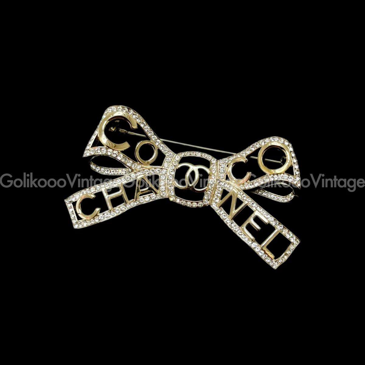 95新 Chanel/香奈儿 金色镂空蝴蝶结字母胸针 2410125