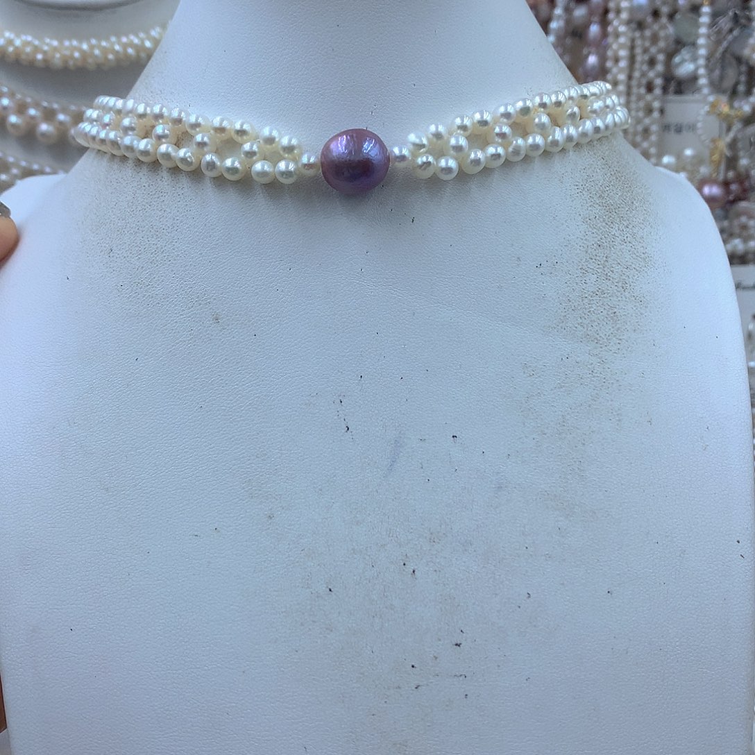 团***。淡水珍珠银S925镶嵌耳饰