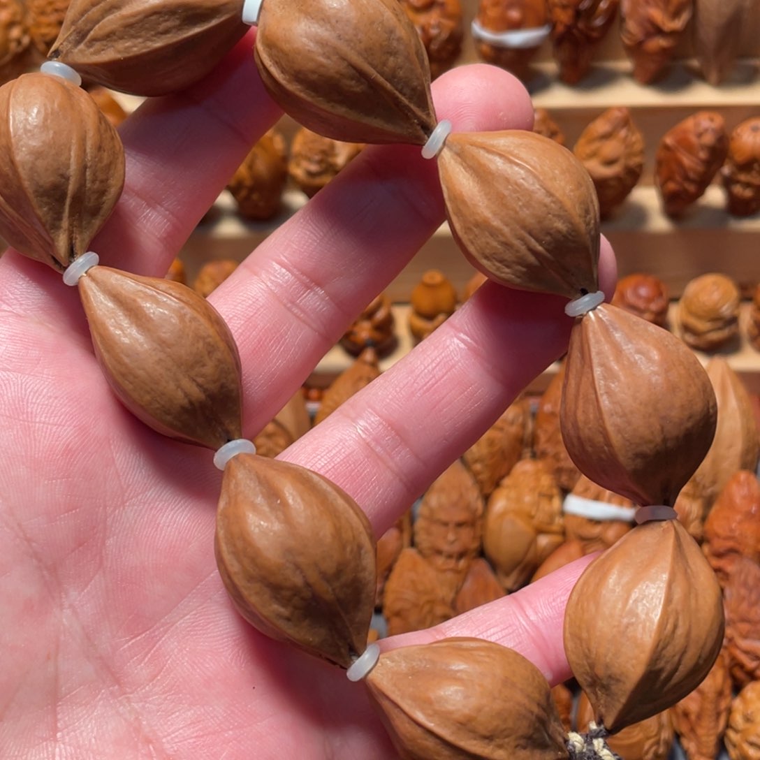 橄榄核吊坠素核大四花